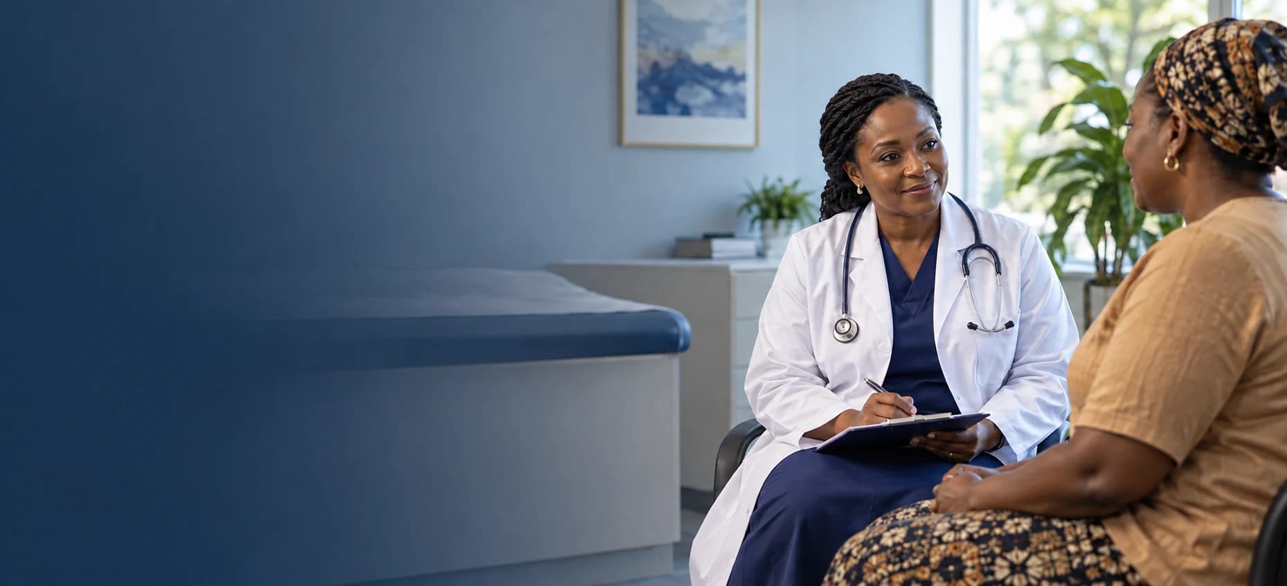 A doctor listening to a patient during a consultation